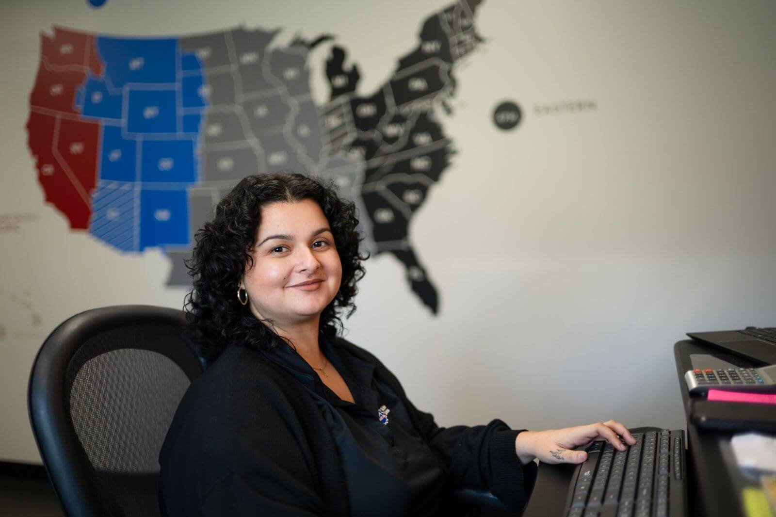 Smiling girl at workplace
