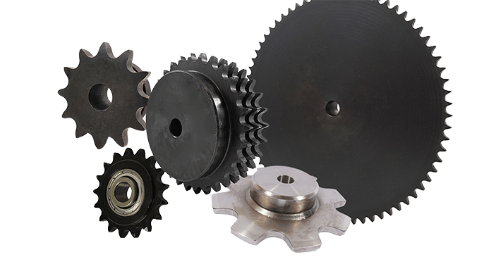 Collection of various metal gears on a white background